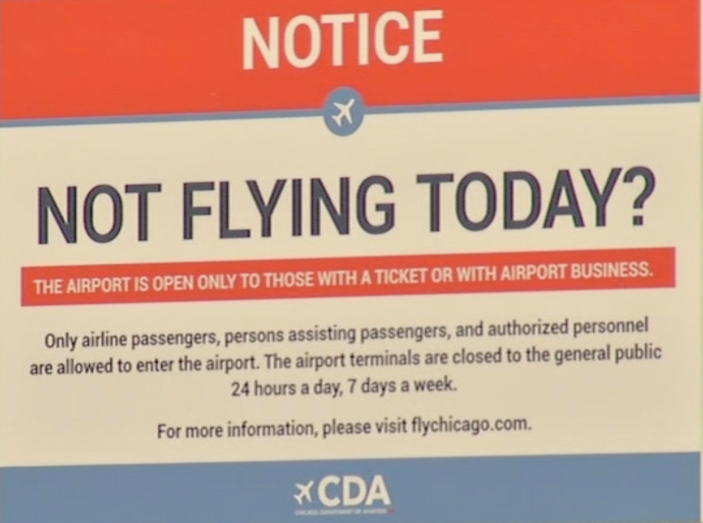 Chicago Department of Aviation sign reading "Notice: Not Flying Today? The Airport is Open Only to Those with a Ticket or with Airport Business..."